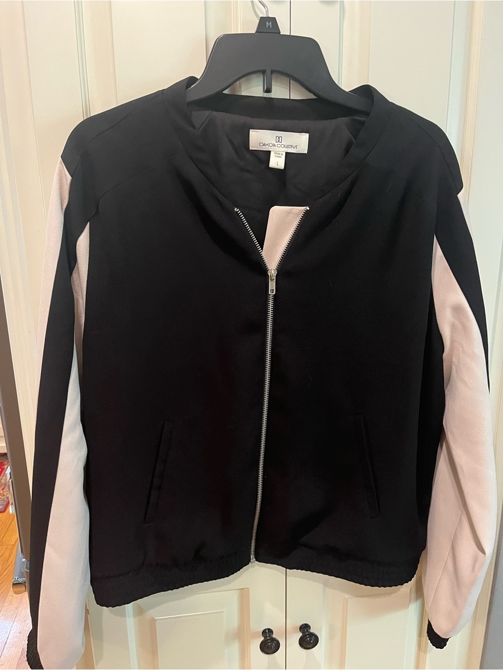 Black Jacket with Pale Pink Sleeves